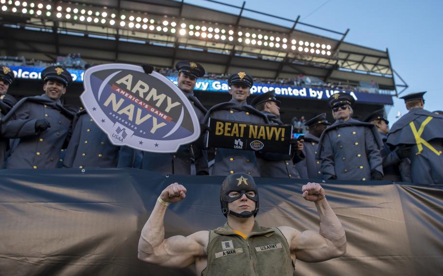 The A-Man, Army Academy sophomore Dylan Carmoey, flexes some muscles during the annual Army-Navy football game played in Philadelphia on Saturday, Dec. 10, 2022. Army won 20-17 in double overtime.