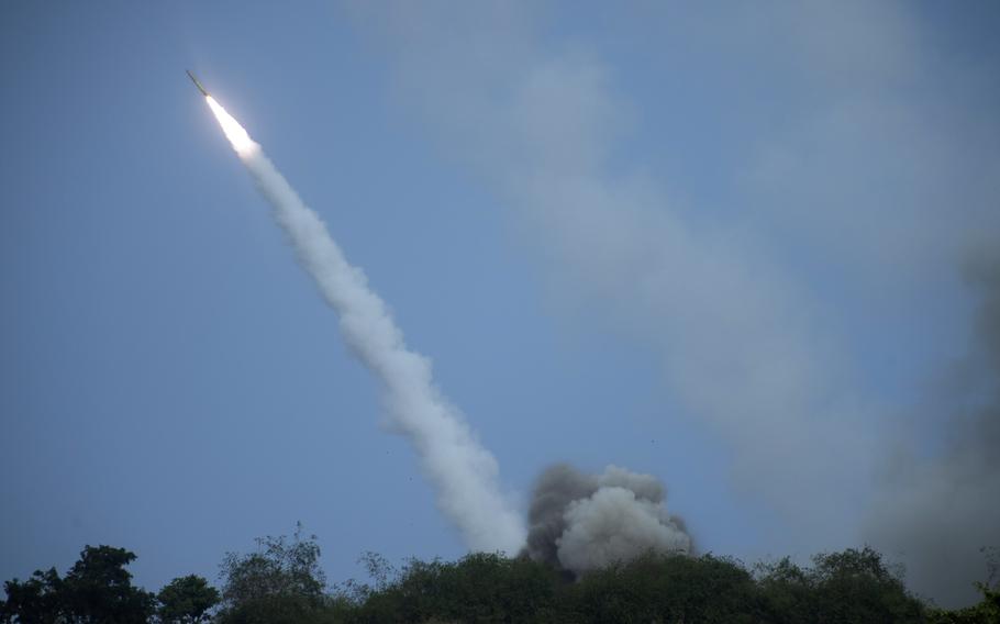 A rocket fires from an M142 High Mobility Artillery Rocket System, or HIMARS, during a Balikatan drill at Naval Station Leovigildo Gantioqui in San Antonio, Philippines, Wednesday, April 26, 2023.