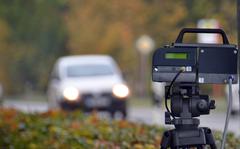 An automatic speed camera enforces the speed limit on a German roadside. Higher fines for speeding and illegal parking will take effect in Germany in November. Failure to build an emergency lane, or driving through an emergency lane will get your license suspended for a month plus a fine.