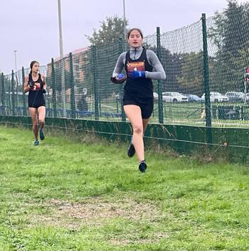 Vanessa Alder and younger sister Lily compete and train constantly with each other, including at this race earlier in the season. Vanessa Alder broke the course record Saturday at the DODEA European cross country championships in Baumholder, Germany.