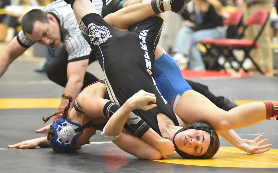 Ramstein’s Liberty Snyder had Hohenfels’ Cooper Avera turned upside down before he eventually pinned her in a match at 113 pounds Friday, Feb. 9, 2024, at the DODEA European Wrestling Championships in Wiesbaden, Germany.