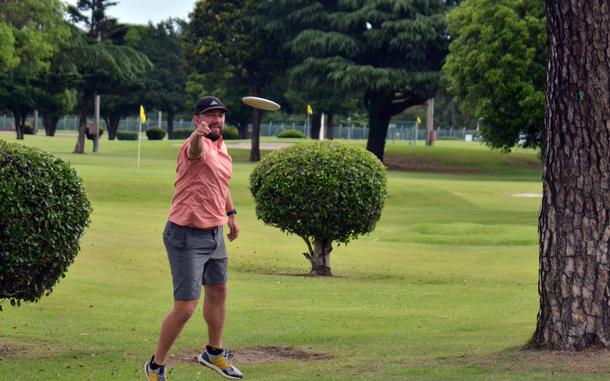 Nate Sexton, who won the United States Disc Golf Championship in 2017, plays a hole at Yokota Air Base, Japan, May 25, 2024.