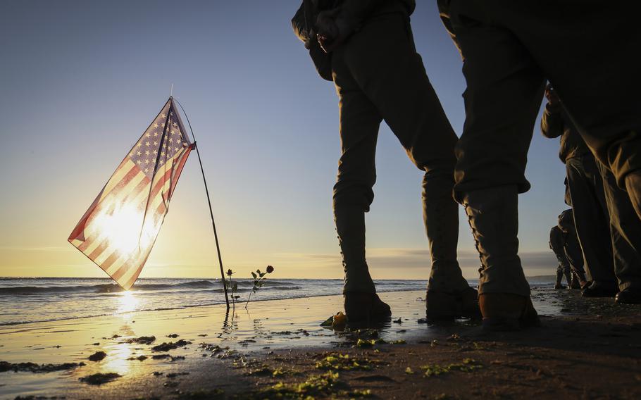 World War II reenactors gather on Omaha Beach in Saint-Laurent-sur-Mer, Normandy, Sunday, June 6, 2021, the day of 77th anniversary of the assault that helped bring an end to World War II. 