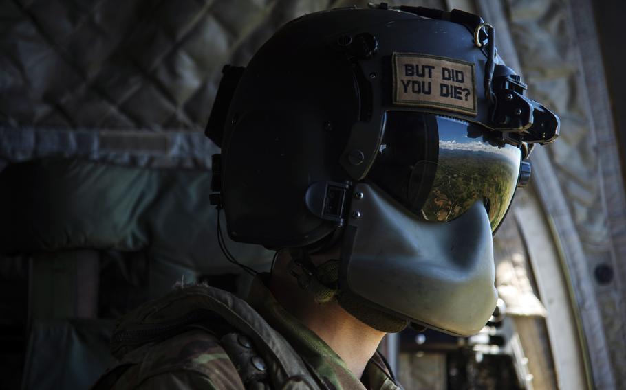 Army Spc. Kaleb Hamilton, a CH-47F Chinook crew chief with 3rd Battalion, 25th Aviation Regiment, flies to Lal-lo Airport during Balikatan training in the Philippines on May 4, 2024.