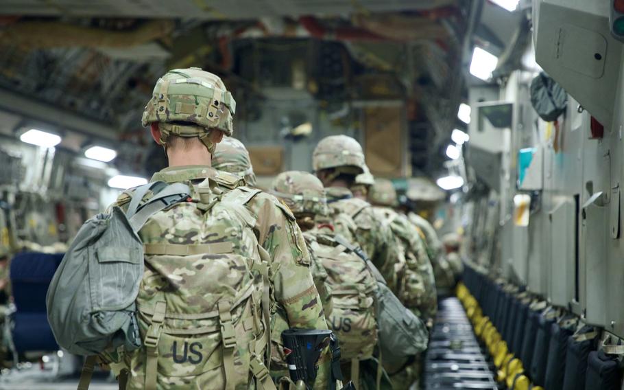 U.S. soldiers board an aircraft.