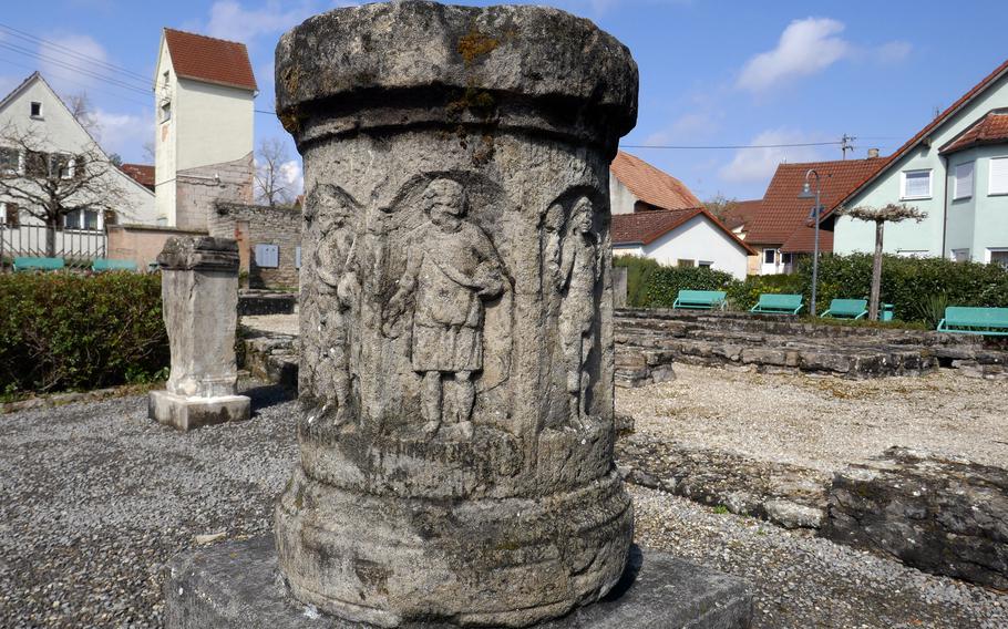 This stone was probably part of a column dedicated to the Roman god Jupiter. The figures on it are of Saturn, Venus, Jupiter, Mars, Mercury and Luna. In the background are the remnants of the Roman bath that once stood here in Jagsthausen. About 12 miles south of Osterburken, it once also had a fort protecting the Limes, the boundary of the Roman Empire.