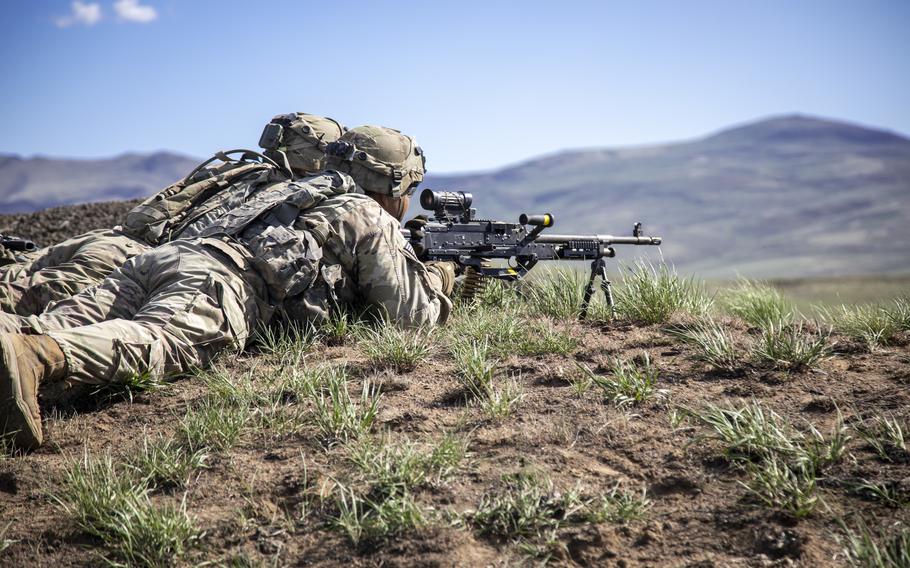 Infantry Regiment, 2nd Stryker Brigade Combat Team, 7th Infantry Division, prepare to fire the M240B downrange while conducting a Fire Support Coordination Exercise during Bayonet Focus at Yakima Training Center May 3, 2021.