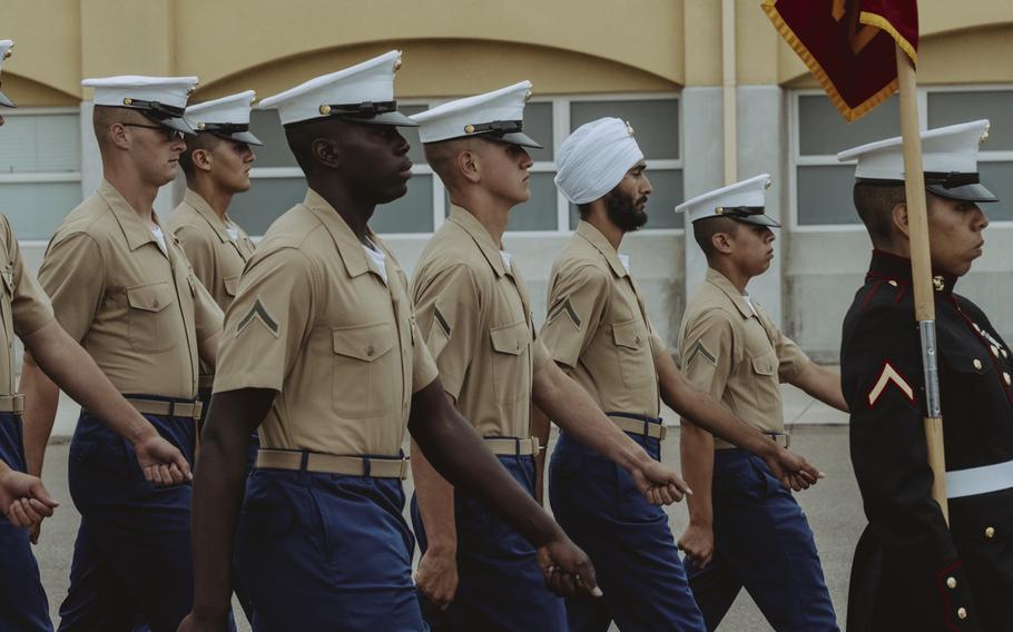 Pfc. Jaskirat Singh, third from the right, marches with the Marine Corps’ Golf Company, 2nd Recruit Training Battalion, at a graduation ceremony Aug. 11, 2023, at Marine Corps Recruit Depot San Diego in California.