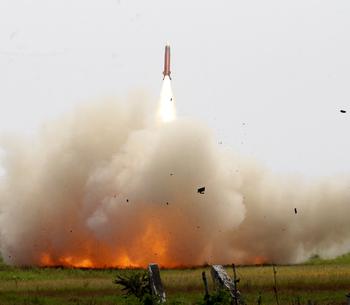 A Patriot missile is fired during a Balikatan drill at Naval Station Leovigildo Gantioqui in San Antonio, Philippines, Tuesday, April 25, 2023.