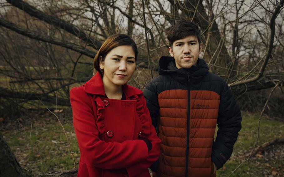 Nasir Sultani and his sister Masooma Sultani pose for a portrait in Berlin, Germany, on Dec. 3, 2021. 