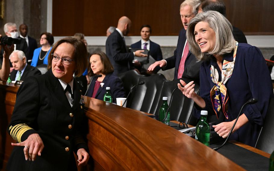 Sen. Joni Ernst (R-Iowa) chats with Adm. Lisa M. Franchetti before an Armed Services hearing to examine her nomination to be chief of naval operations on Sept. 14, 2023.