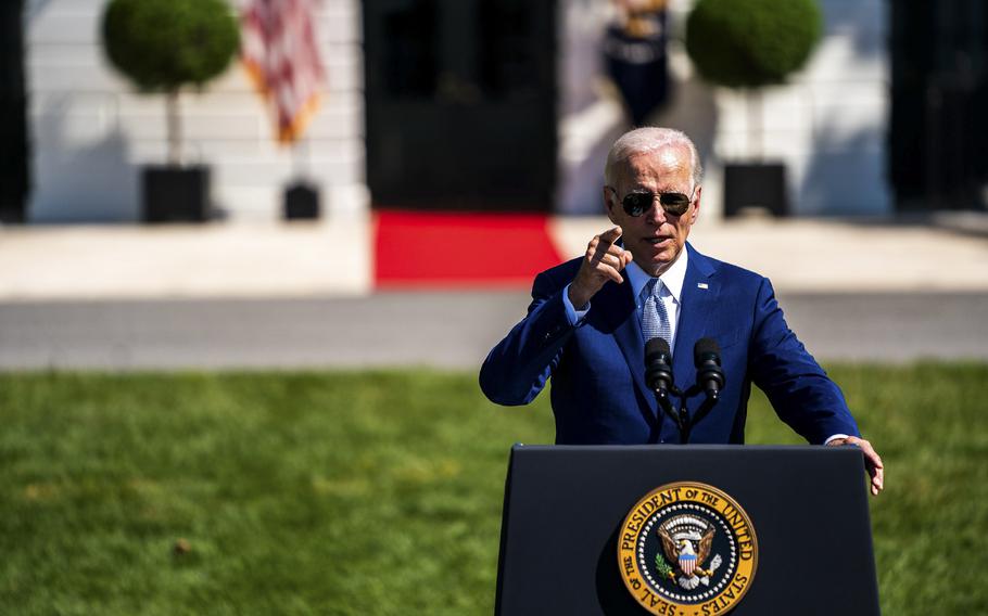 President Biden delivers remarks Tuesday during the signing of the CHIPS and Science Act of 2022 on the South Lawn of the White House. 