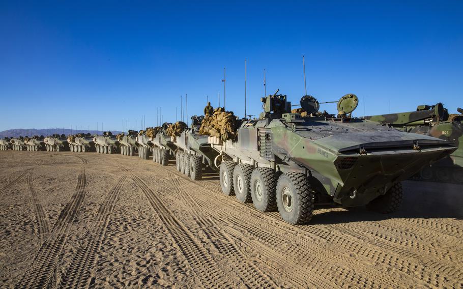 Marine Corps Amphibious Combat Vehicles move in a convoy during a warfighting exercise at Marine Corps Air Ground Combat Center, Twentynine Palms, Calif., on Feb. 20, 2021. 