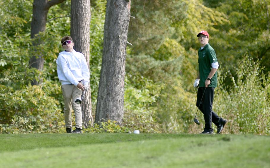 Wiesbaden’s Jonah Harvey, left, and Naples’ Christian Waldeck watch Harvey’s tee shot on the No. 18 hole Thursday during the DODEA European golf championships at the Rheinblick Golf Course in Wiesbaden, Germany.