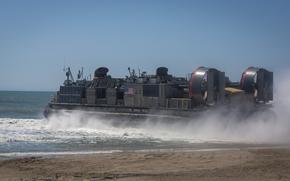 U.S. Marines with the 24th Marine Expeditionary Unit (MEU) and Sailors with the USS Wasp (LHD 1), Amphibious Ready Group (ARG), conduct amphibious operations from a Landing Craft Air Cushion (LCAC) on Marine Corps Base Camp Lejeune, April 15, 2024. The LCAC transports cargo, high mobility multi-purpose vehicles, and personnel for ship to shore movements capable of conducting amphibious missions across the full range of military operations.The Purpose of COMPTUEX is to train and certify the 24th MEU’s Command Element (CE), Aviation Combat Element (ACE), Ground Combat Element (GCE) and the Logistics Combat Element (LCE) as a capable Marine Air Ground Task Force (MAGTF) that can execute special skills operations along with the Amphibious Ready Group (ARG). COMPTUEX offers an enhanced opportunity for Navy and Marine Corps interoperability training in preparation for the Wasp ARG-MEU’s upcoming deployment. (U.S. Marine Corps Photo by Lance Cpl. Adam Scalin)