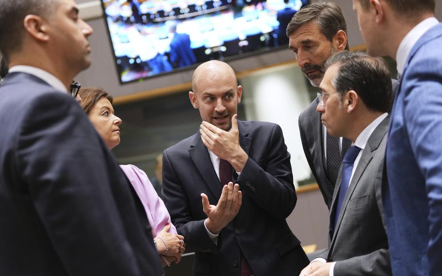 Leaders speak in a group