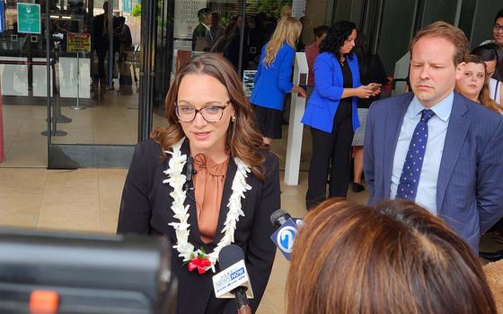 Plaintiffs’ attorney Kristina Baehr speaks with reporters outside U.S. District Court in Honolulu, May 13, 2024, following the conclusion of the trial phase of Feindt vs. United States.