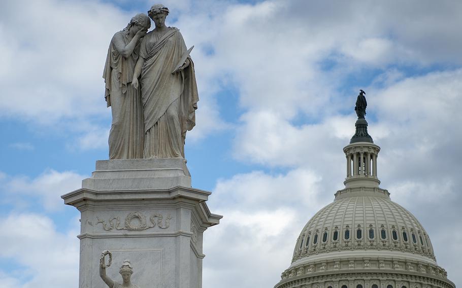 The Peace Monument is seen in Washington on Feb. 13, 2019, with the dome of the U.S. Capitol in the background. 