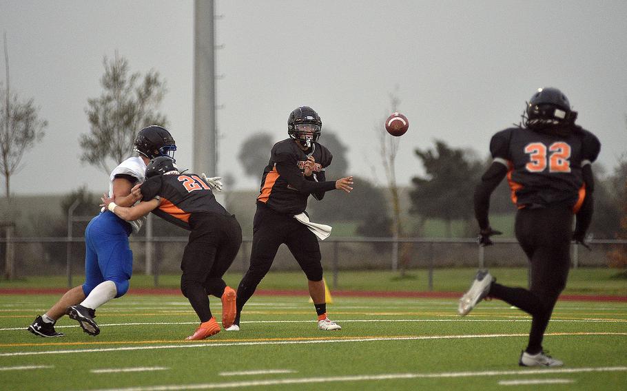 Sentinel quarterback Casey Supinger throws a pass during a game on Sept. 29, 2023, at Spangdahlem High School in Spangdahlem, Germany.