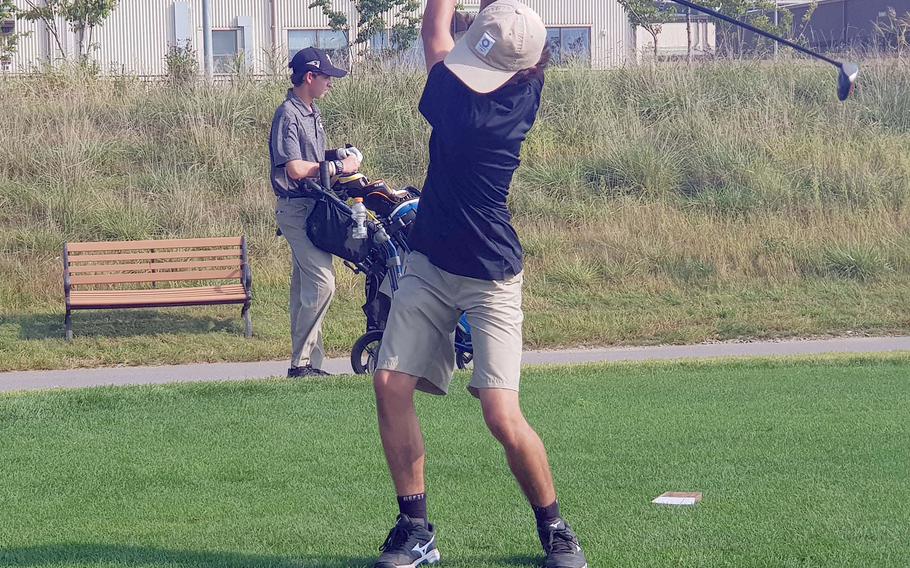 Humphreys' Julian Bourne tees off at the ninth hole en route to a 10 and 8 win over Dylan Watson of Daegu during Thursday's DODEA-Korea golf matches.