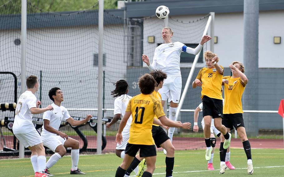 Kelan Vaughn heads the ball.
