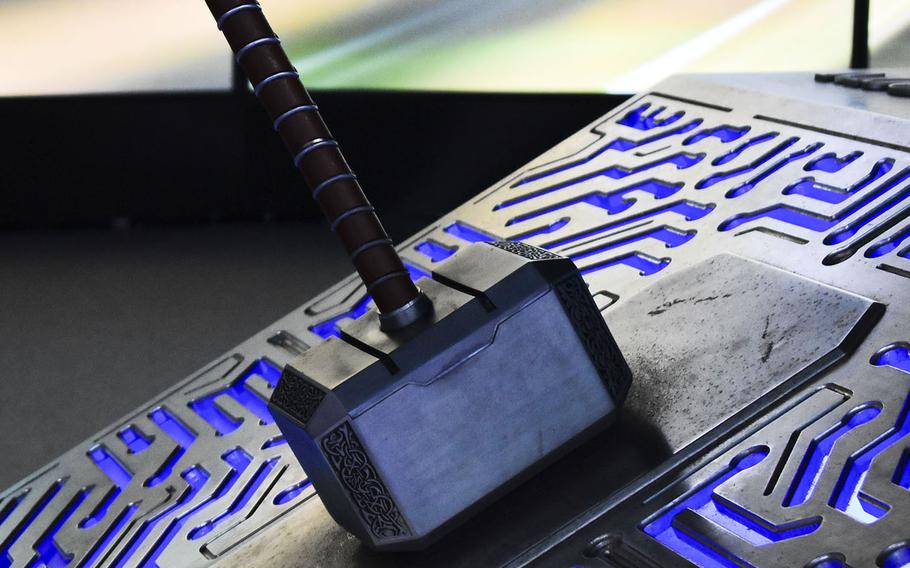Thor's Mjolnir, or hammer, from the Marvel Cinematic Universe, sits on a glowing display at the Avengers S.T.A.T.I.O.N. exhibit in Tokorozawa, Japan, on Oct. 22, 2022.