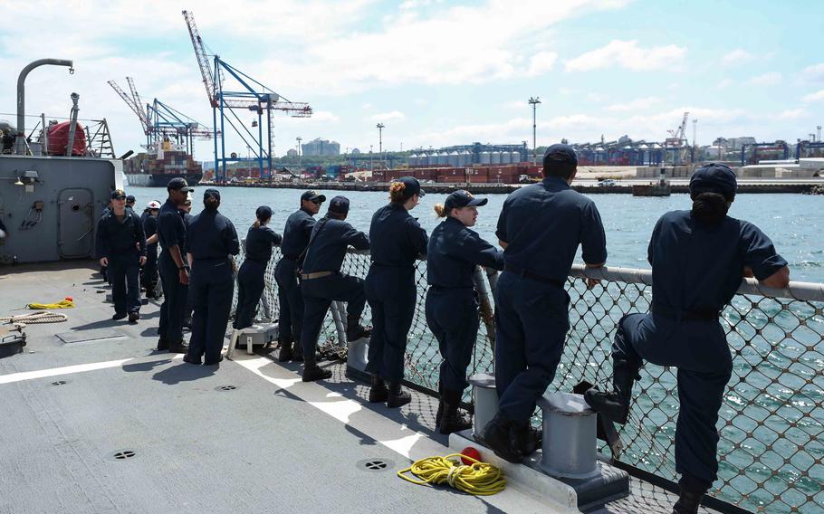 Sailors aboard the USS Ross watch as the ship pulls into Odessa, Ukraine, on June 27, 2021. Some military analysts think Russian President Vladimir Putin would have his sights set on Odessa if he sends Russian forces into Ukraine.