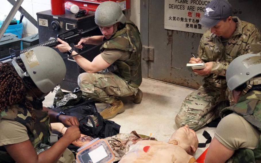 Project Lavoy medics test their new blood transfusion field kit during a casualty exercise at Kadena Air Base, Okinawa, Feb. 13, 2024.