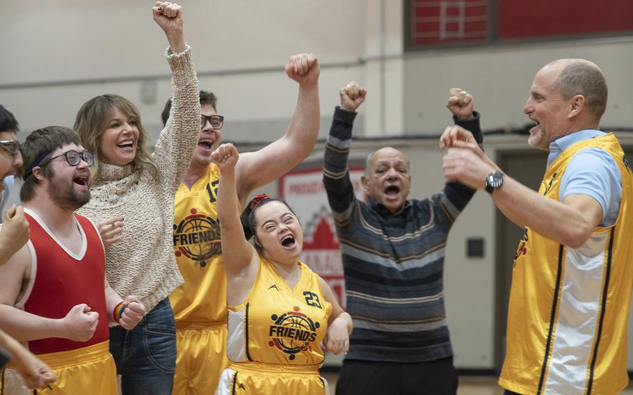 From left, Kevin Iannucci, Kaitlin Olson, James Day Keith, Madison Tevlin, Cheech Marin and Woody Harrelson in a scene from “Champions.” The movie about a man who coaches a team of intellectually disabled adults at a rural community center is now playing at select on-base movie theaters.