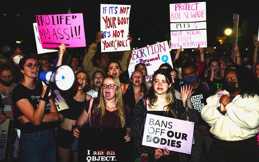 A crowd gathers outside the Supreme Court on May 2, 2022, after a purported leak indicates that Roe vs. Wade will be overturned.
