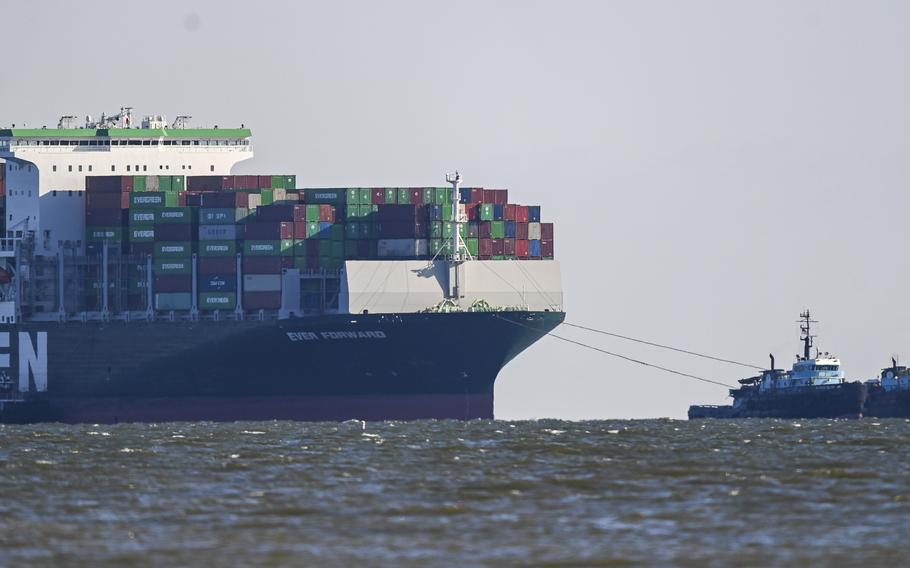 Tug boats help free the Ever Forward south of Baltimore in 2022 after it ran aground and was stuck for a month.