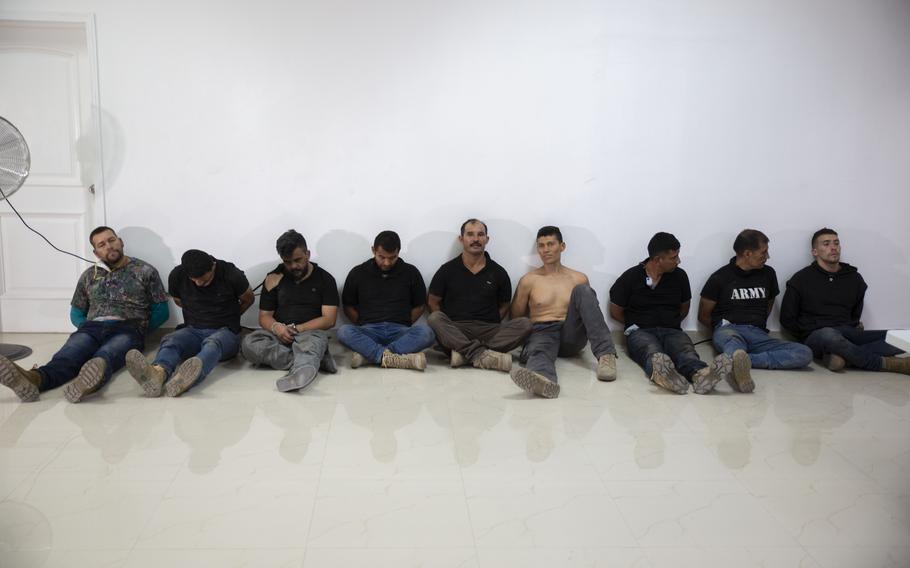 Haitian authorities have implicated at least 20 retired Colombian soldiers in the president's assassination on July 7. (AP Photo/Joseph Odelyn, File)
