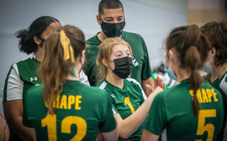 Sophie Bugg gives time-out feedback to her teammates of the SHAPE Spartans during the DODEA-Europe Division I Volleyball Tournament at Ramstein Air Base, Germany, Oct. 29, 2021. 