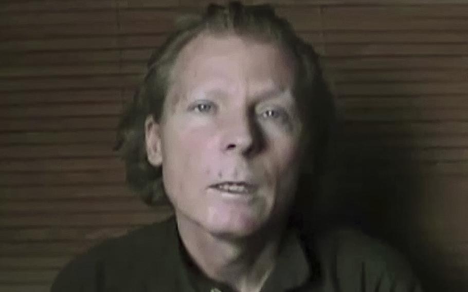 A screen grab shows Australian teacher Timothy Weekes in a video the Taliban released on June 21, 2017, five days after he was abducted outside the American University of Afghanistan in Kabul. According to reports on Saturday, Aug. 13, 2022, Weekes has returned to Afghanistan to celebrate the one-year anniversary of Taliban rule.