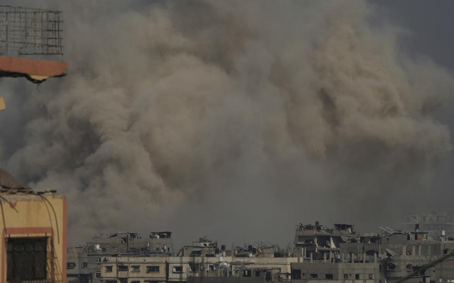 Smoke covers the area after a strike.