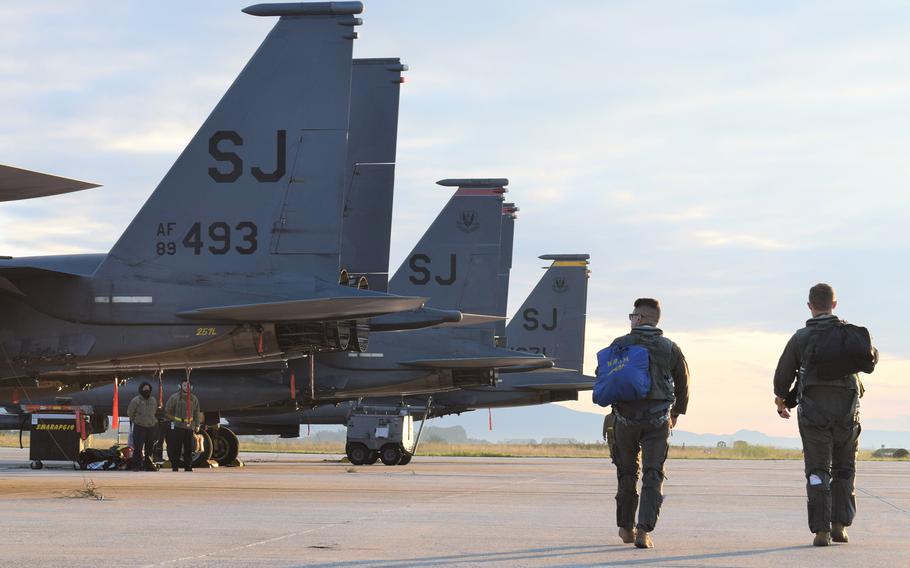 Airmen from the 336th Fighter Squadron, 4th Fighter Wing, Seymour Johnson Air Force Base, N.C., prepare their F-15E Strike Eagles for training with the Greek air force at Larissa Air Base, Greece, Oct. 11, 2021. The U.S. will gain greater access to an array of Greek military bases under a revised defense cooperation deal between the countries.