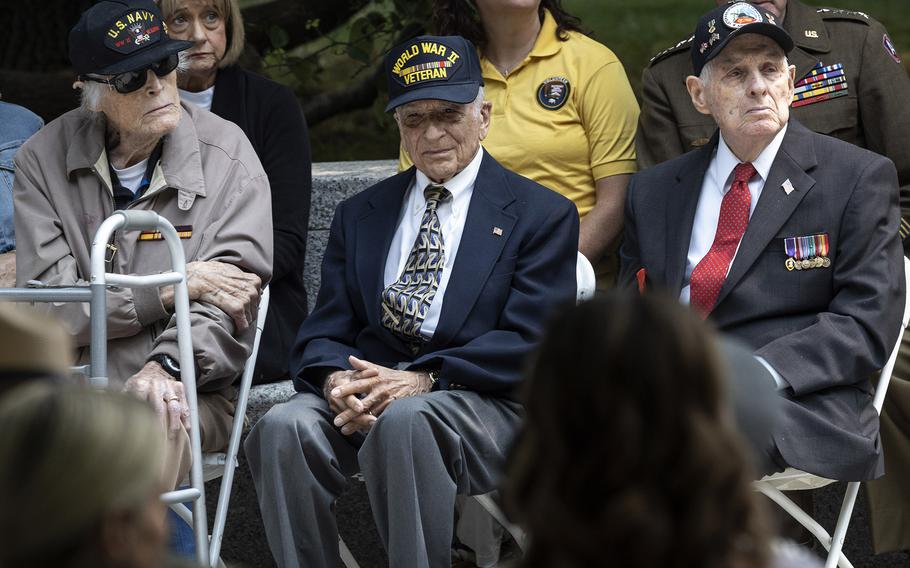 World War II veterans Dixon Hemphill, Frank Cohn and Lincoln Harner, left to right, listen to a speaker during a ceremony at the National World War II Memorial in Washington, D.C., on the 79th anniversary of the start of the D-Day invasion, Tuesday, June 6, 2023.
