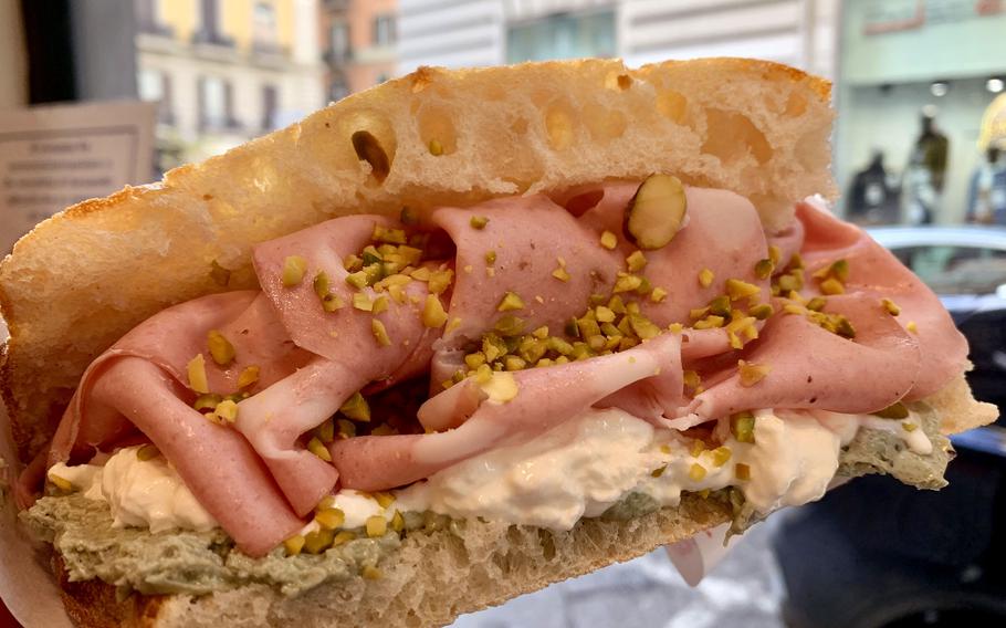Italian sandwich filled with meat and cheese.