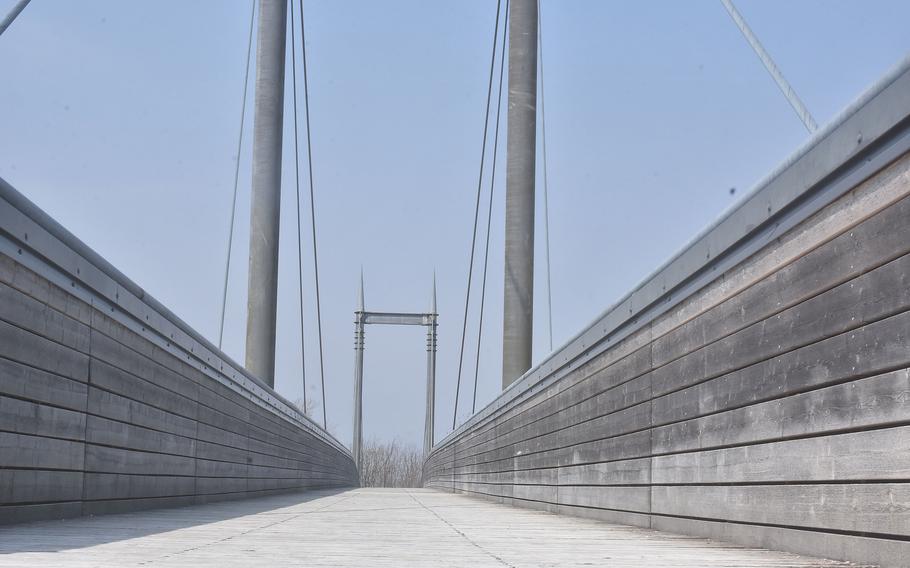 This suspension bridge made of wood and metal separates the beach/campground at Lago Santa Croce in Italy from a "naturalistic oasis." When it's windy, parts of the bridge hum loudly, sounding something akin to a chainsaw or motorbike.