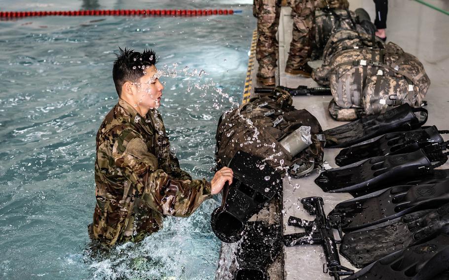 Soldiers take combat water survival training at Lt. Gen. Thomas J. Vandal Training Center at Camp Humphreys, South Korea, May 8, 2021. 