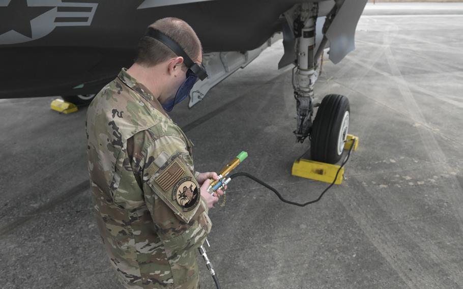 U.S. Air Force Master Sgt. William McNierney, a tactical aircraft maintenance specialist with the Wisconsin Air National Guard’s 115th Fighter Wing, inflates the tire of an F-35A Lightning II aircraft during a Weapons System Evaluation Program exercise Feb. 15, 2024, at Tyndall Air Force Base, Fla. 