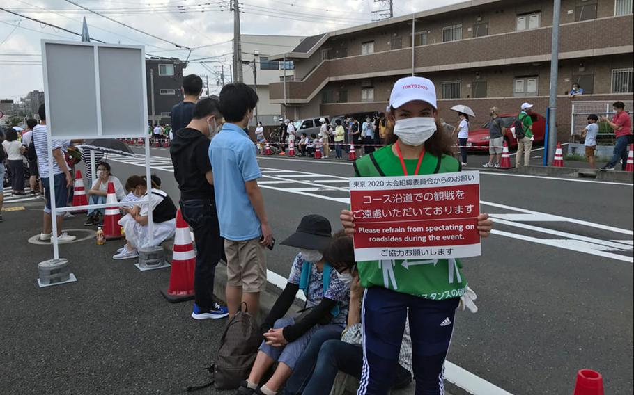 Over the course of the Olympics cycling event July 24-25, 2021, about 50 service members from Camp Zama volunteered to set up barriers and keep the 18 miles of roadway clear and safe.