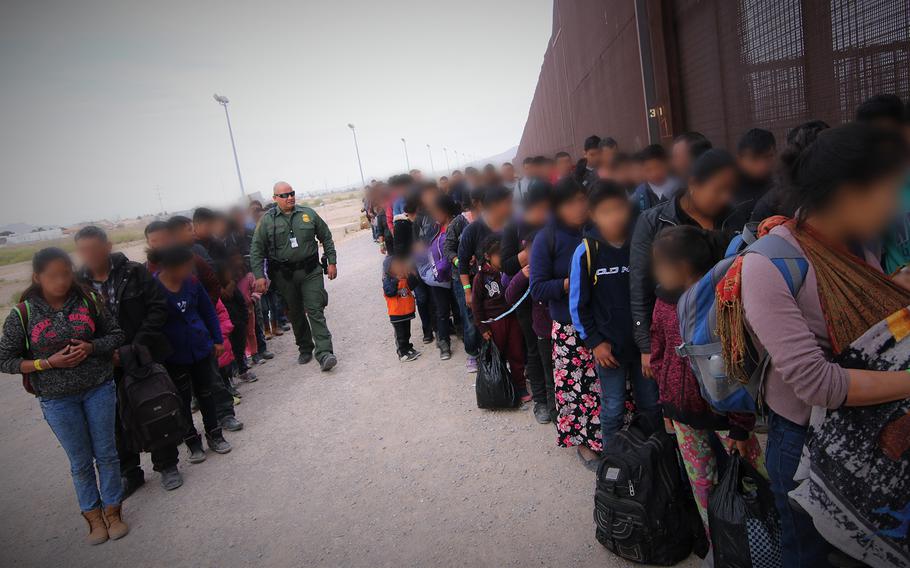U.S. Border Patrol agents assigned to El Paso Sector, El Paso Station intercept a group of approximately 127 migrants on March 7, 2019.