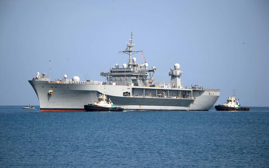 USS Mount Whitney arrives in Djibouti for a sustainment and logistics visit April 24, 2022. The Navy estimates that it would save $179.7 million by mothballing the ship in 2026, according to budget documents.