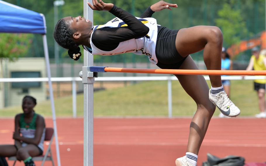 Ansbach’s Tamia McLaughlin clears the bar on her way to nudging AFNORTH’s Victoria Morris for the title in the girls high jump event at the DODEA-Europe track and field championships in Kaiserslautern, Germany. Both cleared 4 feet, 11 inches, but failed to clear the next height. McLaughlin, who also took the long jump title with a leap of 16-02 1/4, won on less attempts during the competition.
