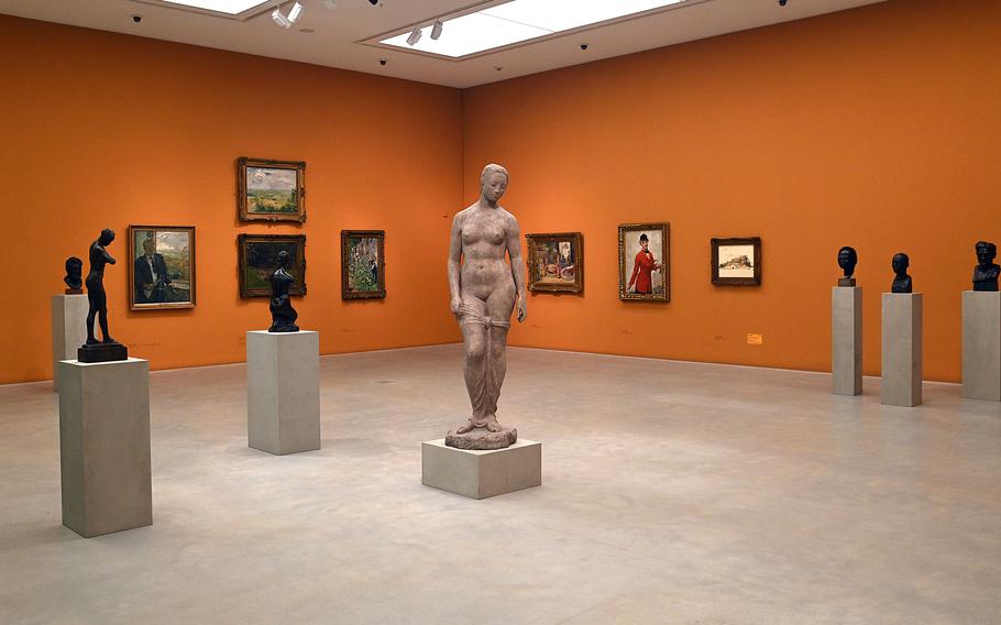 The museum’s room known as Kubus 0 exhibits pieces from the Kunsthalle Mannheim’s permanent collection, including “Tall Standing Woman,” by Wilhelm Lehmbruck, center, from 1910. 