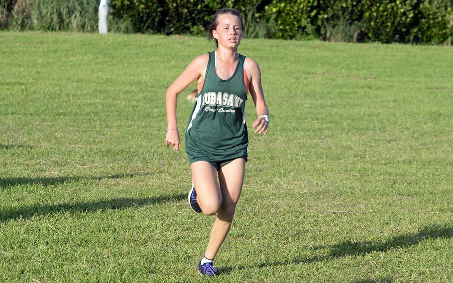 Kubasaki freshman Billi Readinger heads for the finish line and the Okinawa district girls cross country title.