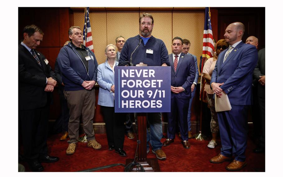 Army veteran Nate Coward speaks during a briefing at the U.S. Capitol in Washington on Feb. 28, 2023, to call for additional federal funding for people who were sickened by their work following the 9/11 terror attacks. Joined by other 9/11 first responders, advocates and members of Congress, Coward told of how he was denied benefits that were offered to emergency workers who responded to the World Trade Center. Last year, lawmakers delivered $1 billion for the World Trade Center Health Program. New legislation introduced in December 2023 will allow excluded Pentagon and Shanksville responders to join the program.