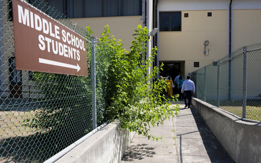 Department of Defense Education Activity Europe representatives walk into Hodja Middle School at Incirlik Air Base in Turkey on July 18, 2023. The purpose of their visit was to assess the base's ability to reopen to military families and check the condition of the school buildings.