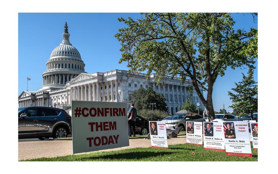 A display outside the U.S. Capitol in Washington on Tuesday, Sept. 19, 2023, shows placards with information on military officers whose promotions have been held up as Sen. Tommy Tuberville, R-Ala., demands the Pentagon change a policy on abortion before the officer promotions are approved.